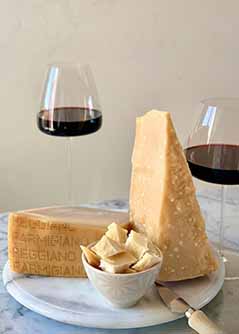 Parmigiano Reggiano & Glasses Of Red Wine