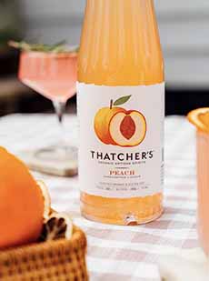 A bottle of Thatcher's Organic Peach Liqueur