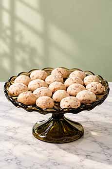 A plate of pecan sandy cookies.