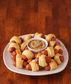 A Plate Of Pigs In A Blanket