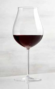 A specially shaped glass to enhance the flavors and aromas of Pinot Noir wine.