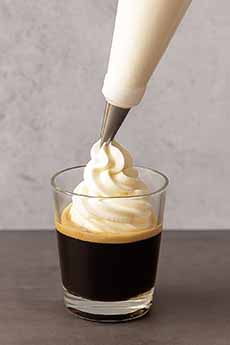 Piping Whipped Cream On An Einspanner