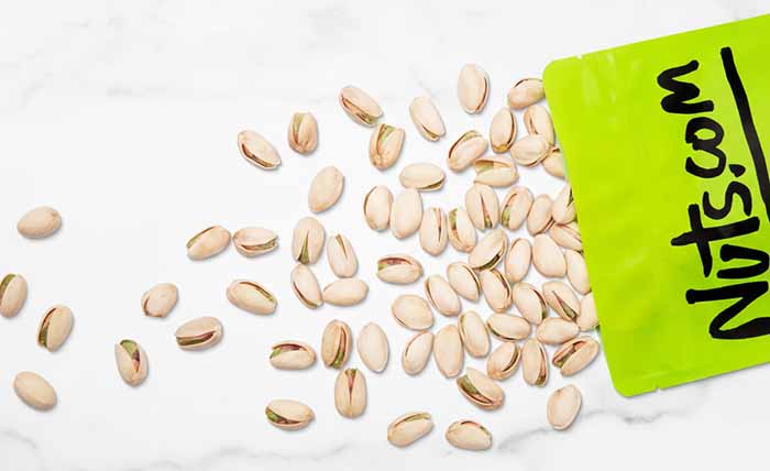 Pistachio Nuts In The Shell, On A Countertop