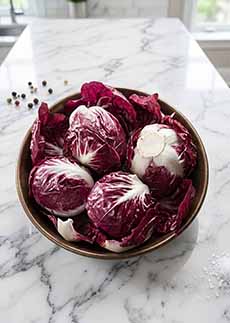 Head Of Radicchio On A Marble Counter