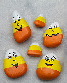 Rocks painted like candy corn