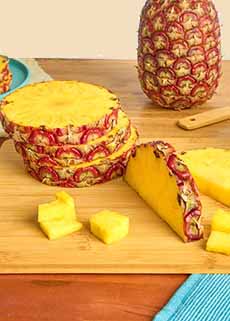 Rubyglow Pineapple Slices On A Cutting Board