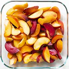 Bowl Of Sliced Peaches