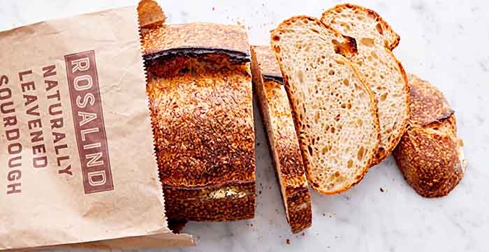 A sliced loaf of sourdough bread.