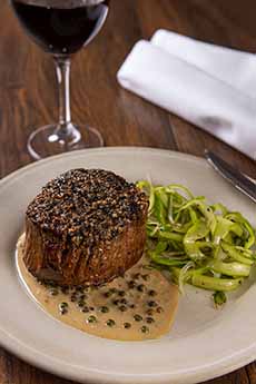 Steak Au Poivre With A Glass Of Red Wine