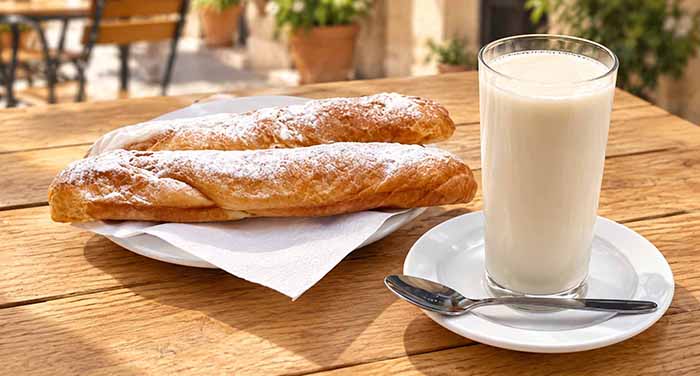 Valencia's horchata de chufa with farton pastries.