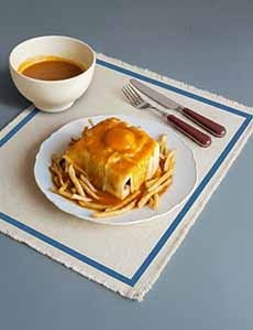 Francesinha especial with a fried egg on top