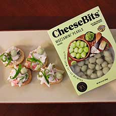 Crab canapes topped with wasabi -flavor Cheese Bits
